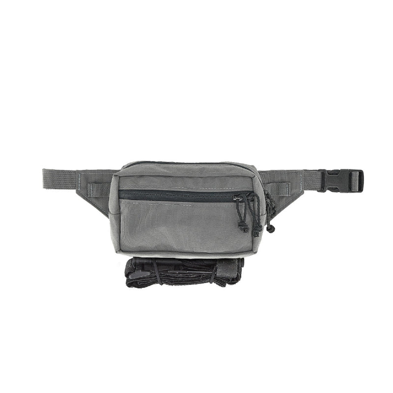 Wolf Grey waist bag with multiple zipper pockets and buckled strap on a white background. Shown with a tourniquet attached to the bottom of the pouch