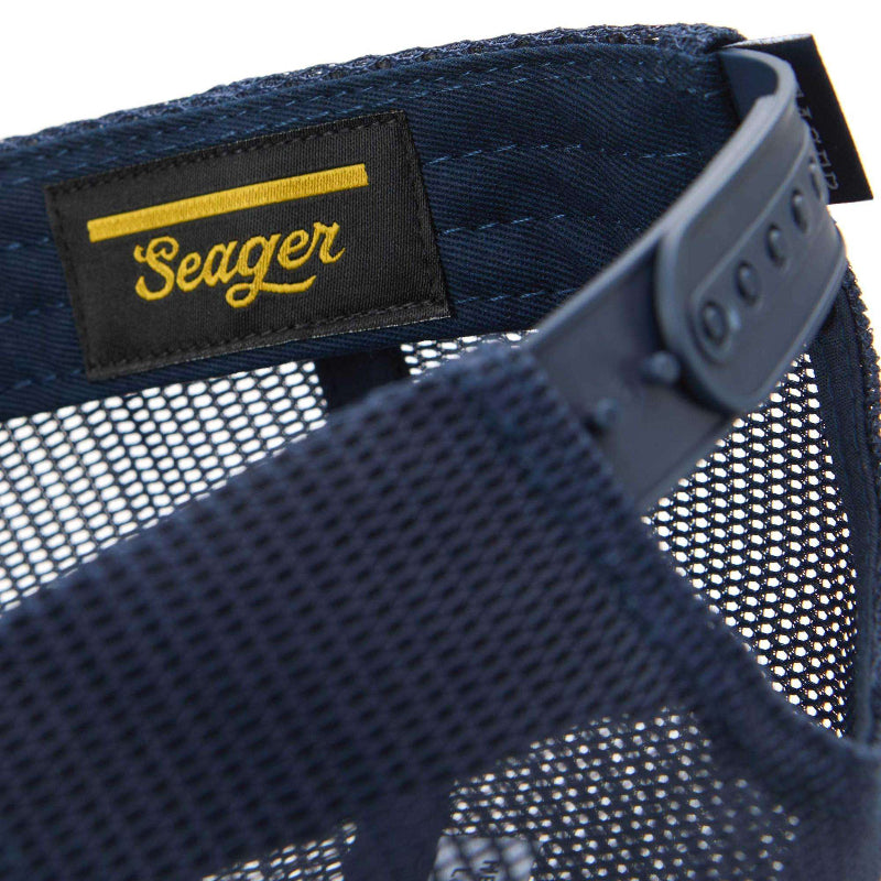 Close-up of a blue mesh cap with a Seager logo on a white background