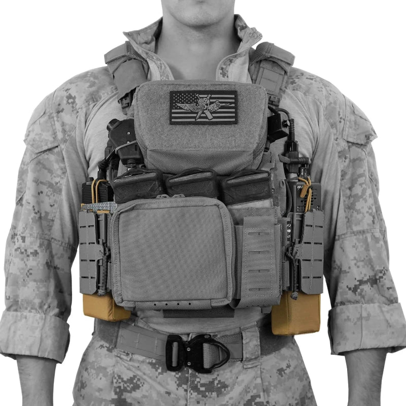 Person wearing a tactical vest with various pouches and equipment on a white background. Radio Wings are highlighted in Coyote Brown