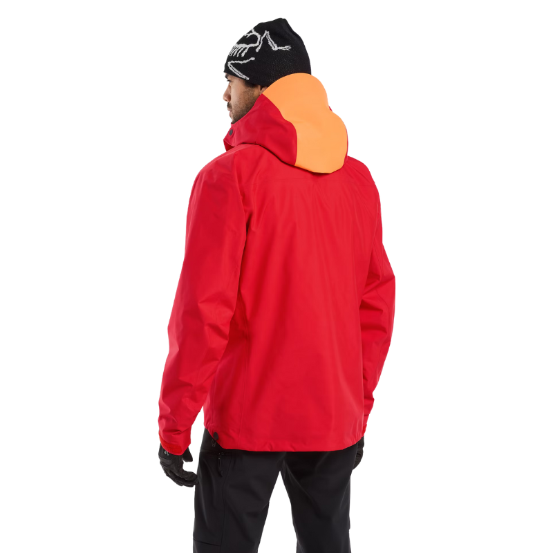 Back view of the Arc'teryx Alpine Guide Jacket in Dynasty II high visibility red showing the professional ski guide GORE TEX PRO winter shell designed for mountain identification and featured in the Arc'teryx on sale collection.