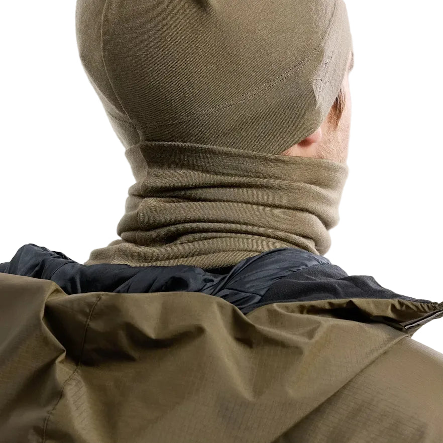 Back view of the Arc'teryx Cold WX Neck Gaiter AR Wool in Crocodile showing the seamless merino wool construction and low-profile shape designed to layer cleanly under jackets or outerwear. Highlights the thermal efficiency, stretch comfort, and cold weather performance ideal for tactical missions and winter field environments.