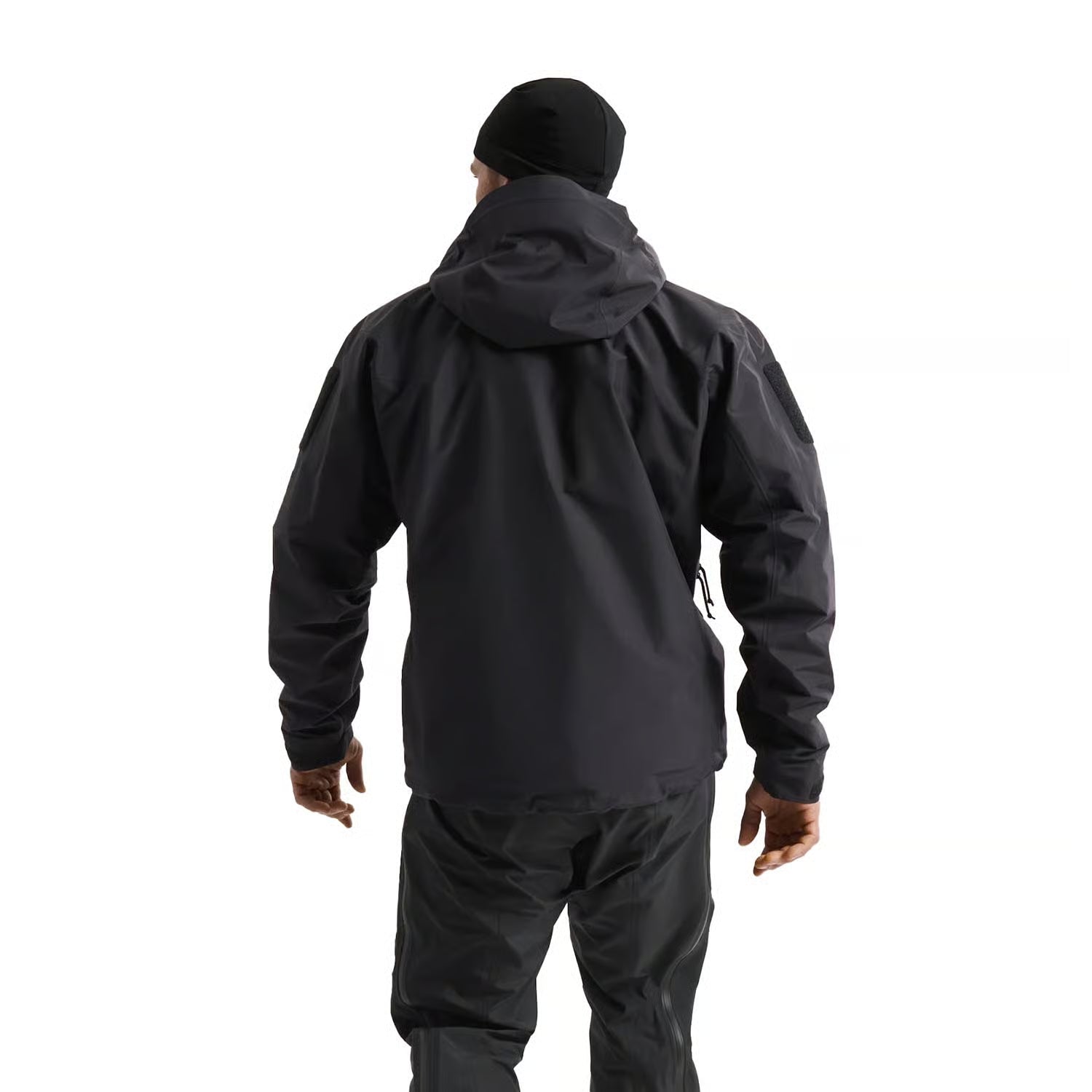 Rear view of Arc'teryx PRO Alpha Jacket GEN 2.3 waterproof military shell designed for full kit integration