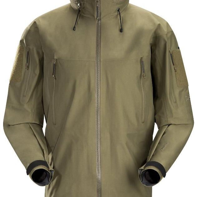 Product shot of the Arc'teryx LEAF Alpha Jacket Gen 2.2 in Crocodile showing the military fit GORE TEX 3 layer waterproof tactical shell with StowHood, arm ID patches, and mission ready ventilation and pocket features for wet weather operations.