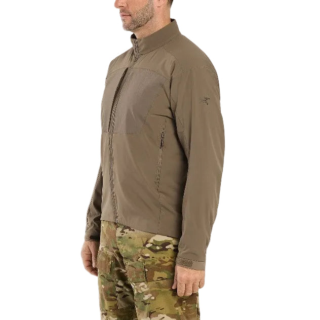 Three quarter worn view of the Arc'teryx LEAF Practitioner AR Jacket in Crocodile showing the streamlined athletic fit, moisture wicking Fortius Air 50 fabric, and Octa Loft insulation designed for active tactical movement and versatile mid layer performance in shifting conditions.