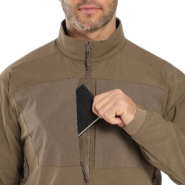 Image showing the Arc'teryx LEAF Practitioner AR Jacket in Crocodile with a hand accessing the front pocket, highlighting the dual chest pocket configuration, smooth No Slip Zip design, and functional storage layout engineered for tactical mobility and mission efficiency.
