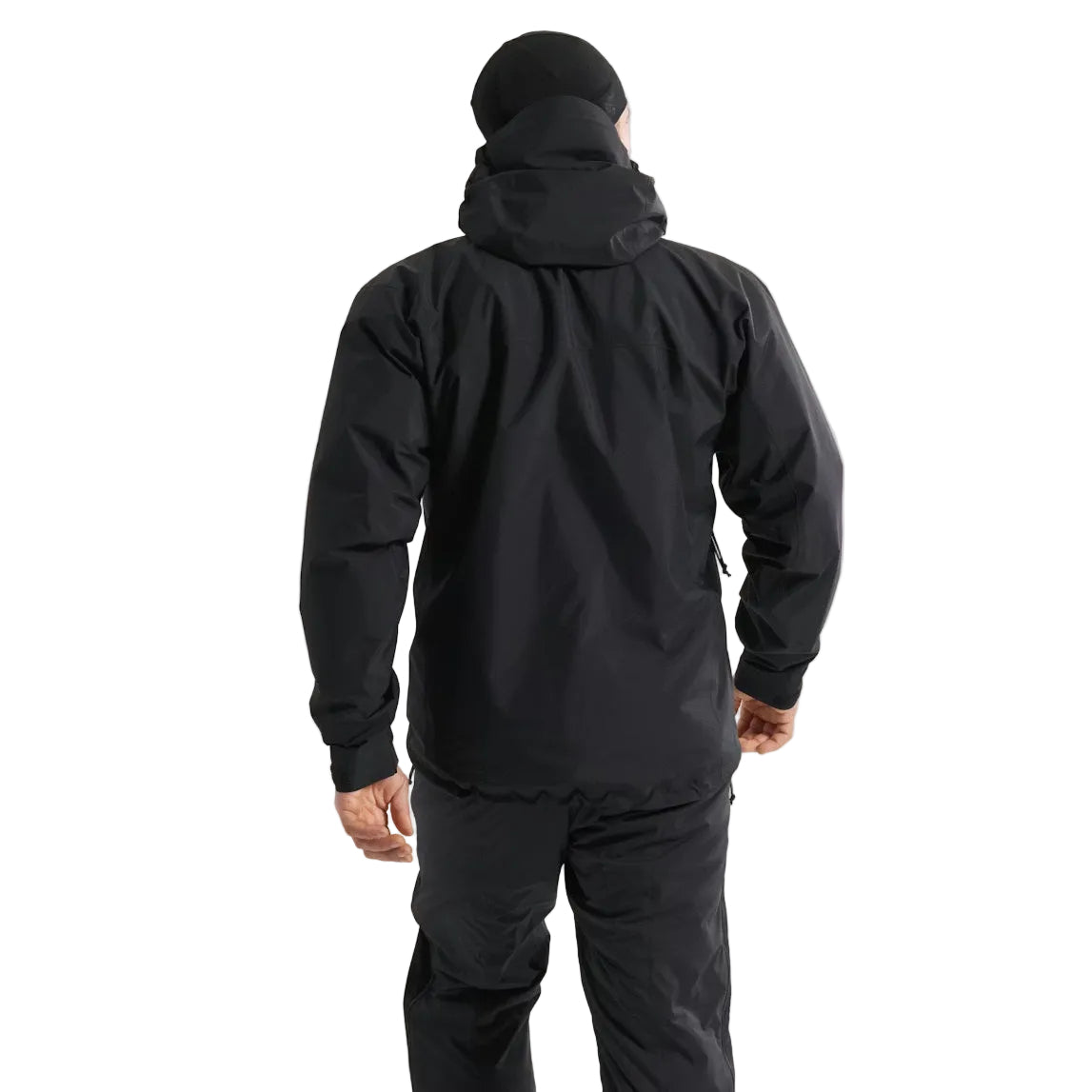 Back worn view of the Arc'teryx PRO Alpha LT Jacket Gen 2.2 in Black showing the military fit patterning, streamlined hood construction, and lightweight GORE TEX 3 layer shell designed for high mobility tactical movement. This PRO-series jacket originates from the Arc'teryx LEAF lineage and is built for wet weather field operations.
