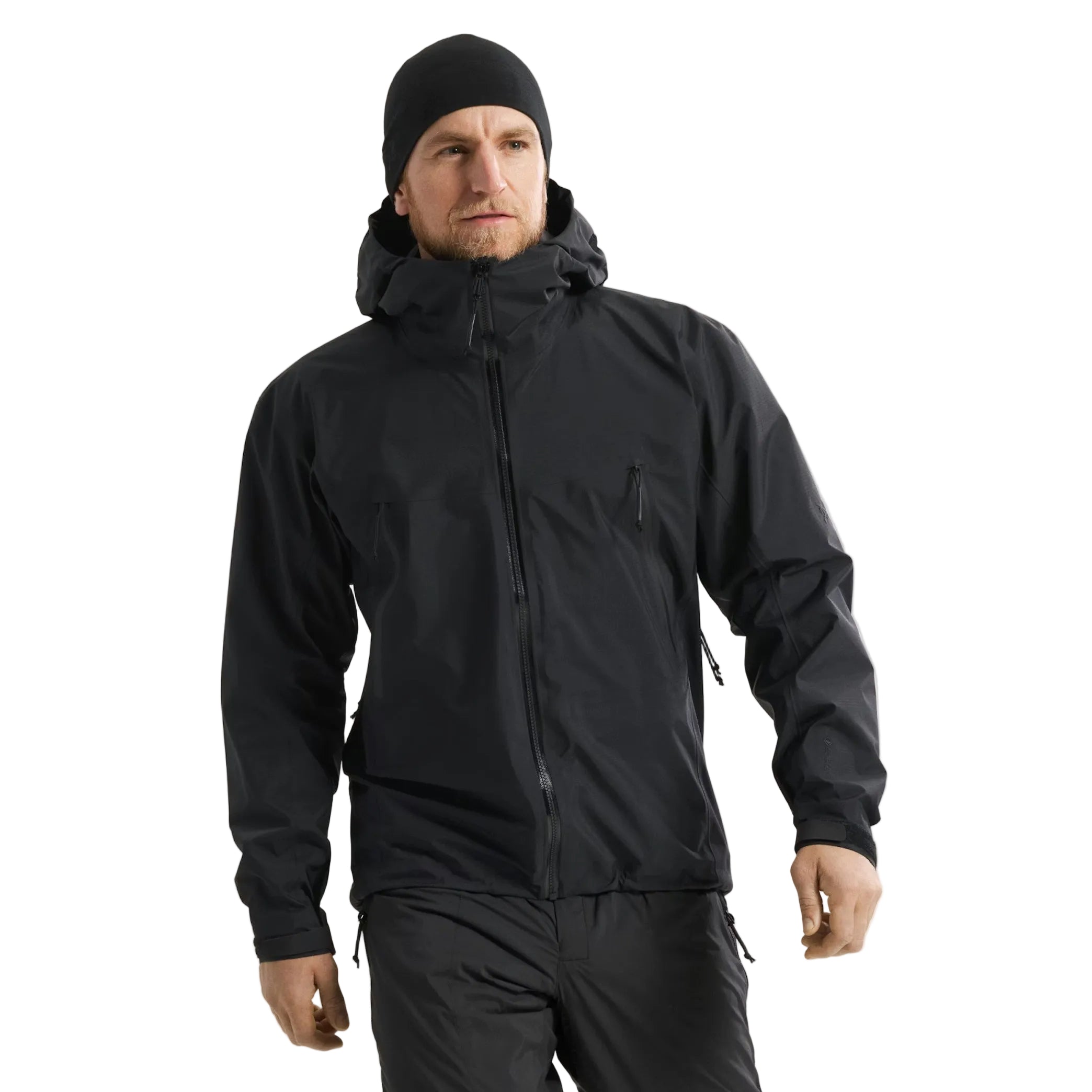 Front worn view of the Arc'teryx PRO Alpha LT Jacket Gen 2.2 in Black showing the streamlined military fit, lightweight GORE TEX 3 layer construction, and low profile tactical design. This PRO-series shell, evolved from the former Arc'teryx LEAF line, is built for wet weather operations and high mobility field performance.
