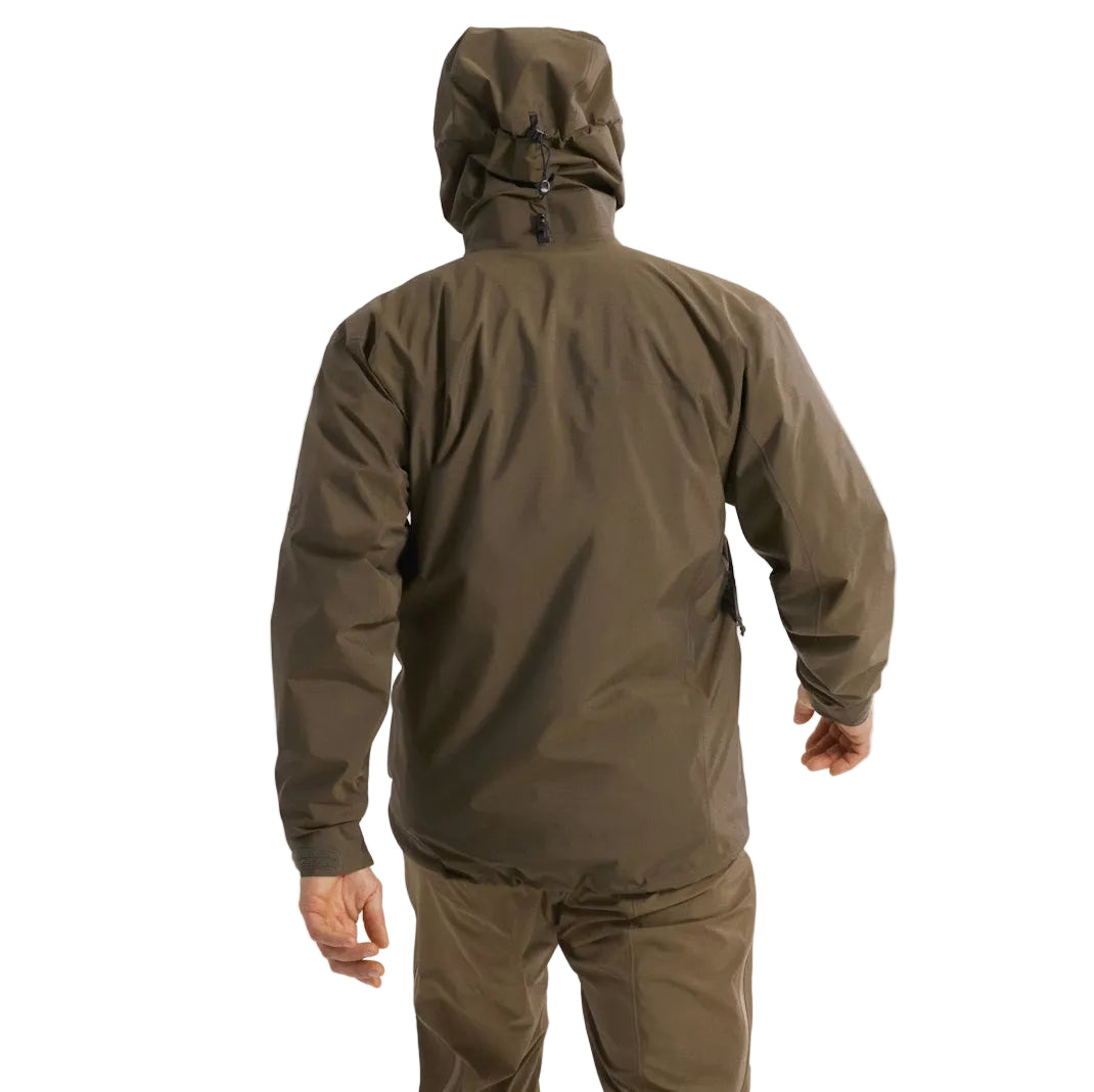 Back worn view of the Arc'teryx PRO Alpha LT Jacket Gen 2.2 in Ranger Green showing the articulated military fit, streamlined hood design, and lightweight GORE TEX 3 layer shell. This PRO-series jacket, evolved from the former Arc'teryx LEAF line, is engineered for mobility, durability, and full weather protection in tactical field environments.