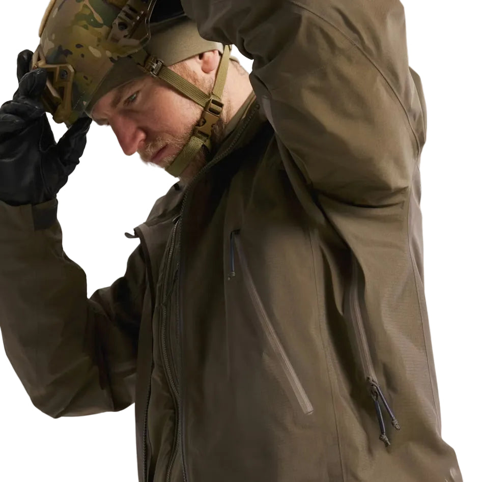 Close up view of the Arc'teryx PRO Alpha LT Jacket Gen 2.2 in Ranger Green being worn, highlighting the No Slip Zip front zipper, TPU zipper pulls, and precise seam construction. Shows the PRO-series tactical design, evolved from the Arc'teryx LEAF line, engineered for durability, weatherproof performance, and efficient field layering.