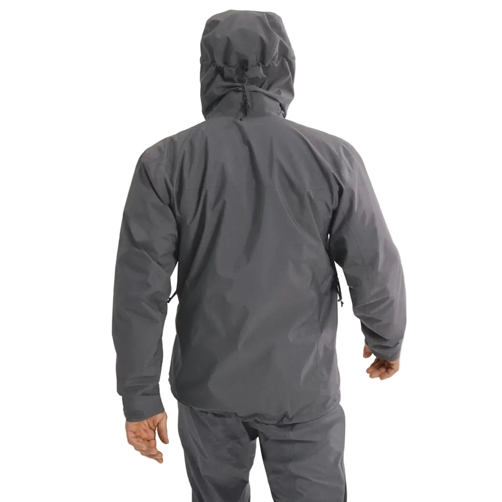 Back worn view of the Arc'teryx PRO Alpha LT Jacket Gen 2.2 in Wolf Grey showing the articulated military fit, streamlined hood profile, and lightweight GORE TEX 3 layer shell construction. This PRO-series jacket, evolved from the Arc'teryx LEAF program, demonstrates full weather protection and mobility for tactical field operations.