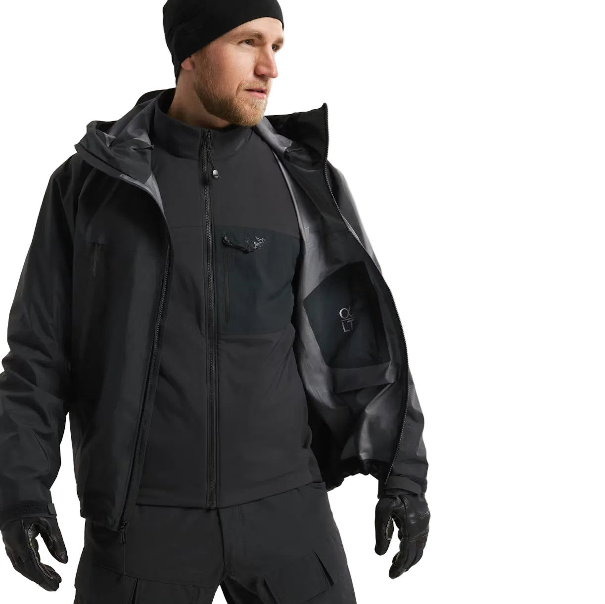 Arc'teryx PRO Atom LT Gen 2.1 in Black worn beneath a waterproof shell jacket, lightweight tactical insulation layer built for modular cold weather systems, moisture management, and professional field operations in wet conditions