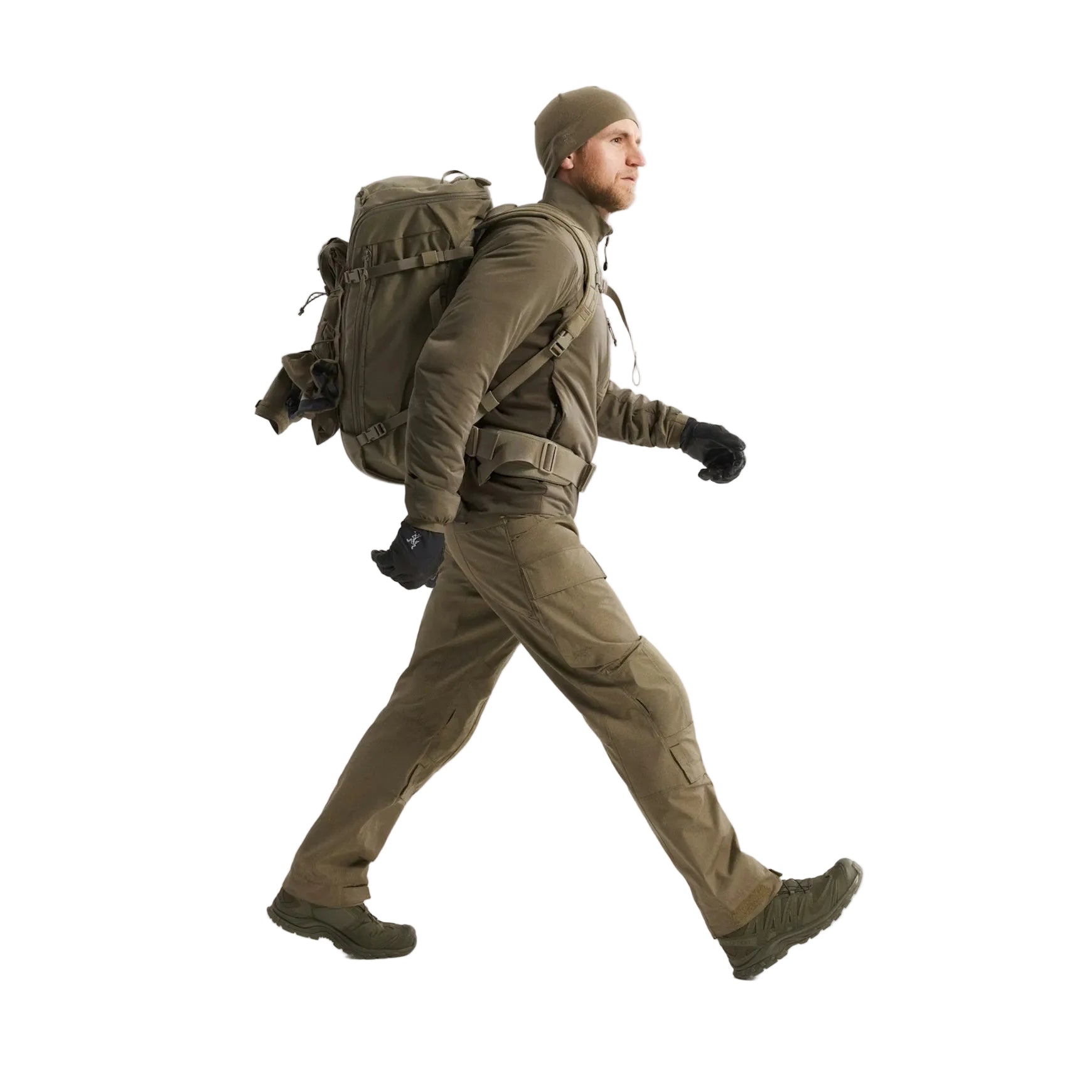 Full body shot of Arc'teryx PRO Atom LT Jacket Gen 2.1 in Crocodile being put on, modular tactical insulation layer designed for cold weather patrol, range work, and mission adaptable layering systems