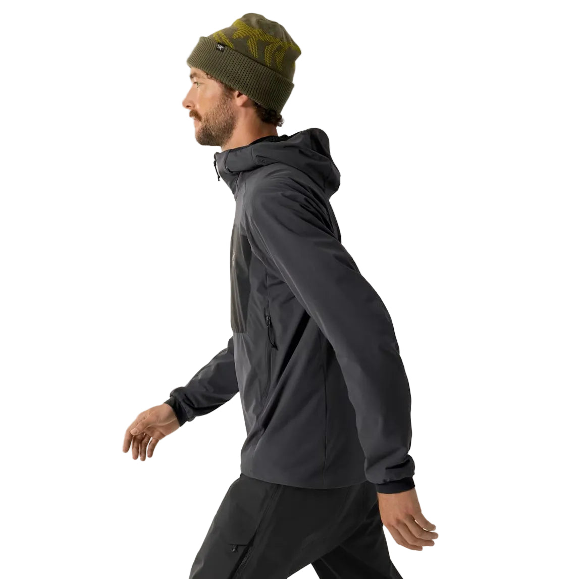 Side view of the Arc'teryx PRO Practitioner AR Hoody in Carbon Copy being worn, showing the articulated patterning, gusseted underarms, and streamlined athletic fit designed for tactical movement and outdoor performance across varied U.S. climates.