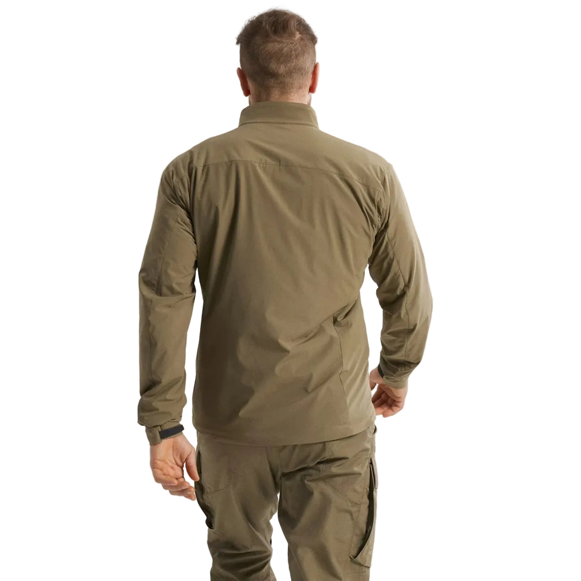 Back view of the Arc'teryx PRO Practitioner AR Jacket in Crocodile being worn, showing the articulated patterning, drop hem, and streamlined Fortius Air 50 shell designed for unrestricted movement. Highlights the PRO-series mid layer’s breathable, water-resistant construction built for field operations, high-output missions, and adaptive layering systems.