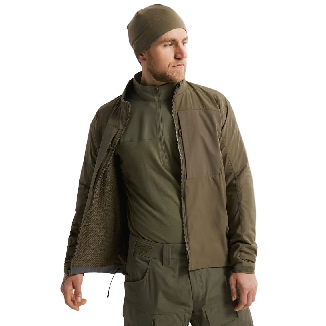 Arc'teryx PRO Practitioner AR Jacket in Ranger Green worn open over a base layer, revealing the Octa Loft insulation and breathable Fortius Air 50 interior structure. Shows how the PRO-series mid layer integrates into a tactical layering system, providing low-bulk warmth, moisture management, and high mobility. Ideal for users comparing Arc'teryx mid-layer insulation, interior construction, and real-world performance under base layers and outer shells.