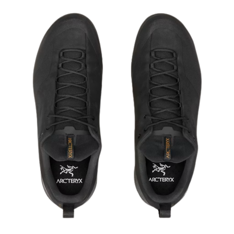 A pair of black Arc'teryx low-top sneakers shown from a top-down view on a plain white background.