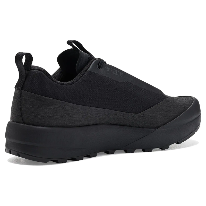 Black Arc'teryx trail running shoe on a white background