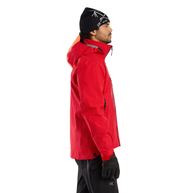 Side view of the Arc’teryx Ski Guide Jacket in Dynasty red, built with rugged GORE-TEX PRO for ski guides, patrol, and rescue professionals - available on clearance.