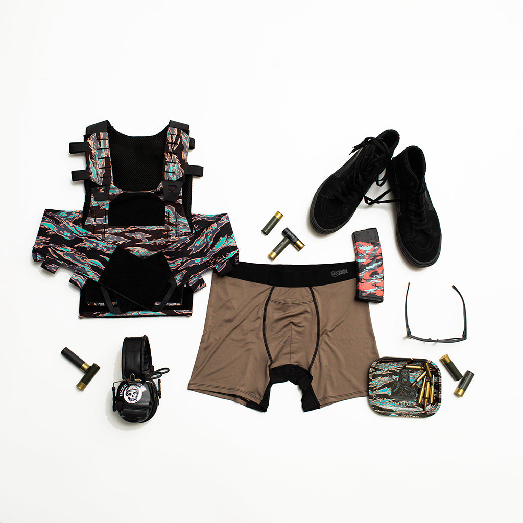 Flat lay of Battle Briefs Men’s Athletic Boxer Briefs in Canteen, showcased as part of your everyday kit. Designed for comfort and performance, these boxer briefs feature moisture-wicking, quick-drying fabric, anti-microbial technology, and a secure, no-ride fit, making them perfect for tactical use, gym sessions, or daily wear.