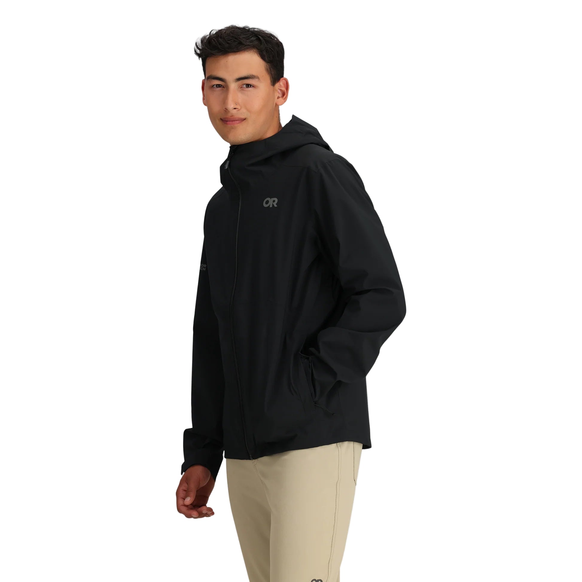Three-quarter view of the black Outdoor Research Stratoburst Stretch Rain Jacket showing sleek pocket placement, articulated fit, and tactical-grade waterproof design