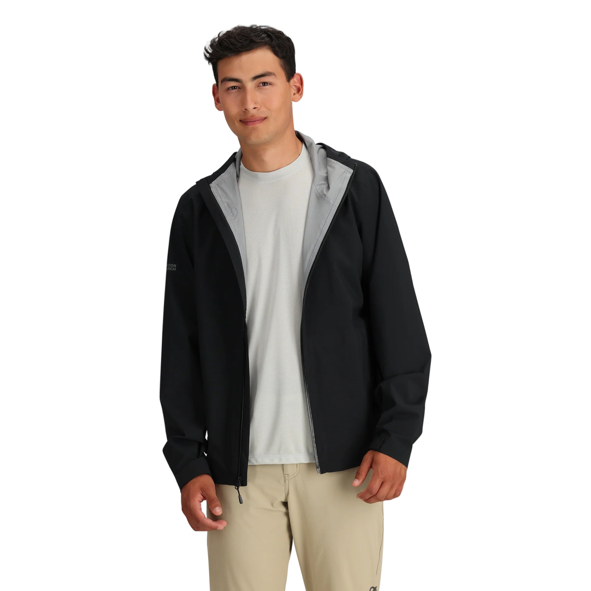 Outdoor Research Stratoburst Rain Jacket in black shown unzipped, highlighting its lightweight tactical fit, interior layering capability, and breathable construction