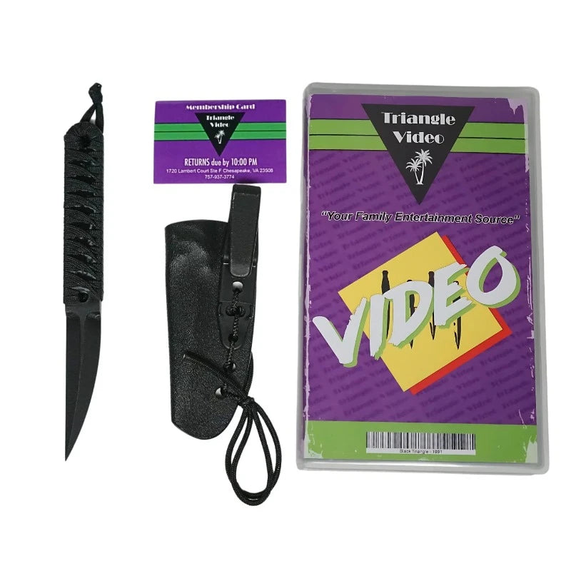 Black Triangle Senka G10 non-metallic tool with sheath, VHS case packaging, and Black Summer holographic sticker
