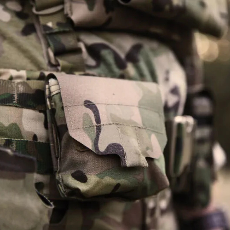 Close-up of the Blue Force Gear Boo Boo Kit Pouch showing the BLIP pull tab and secure flap closure for quick access.