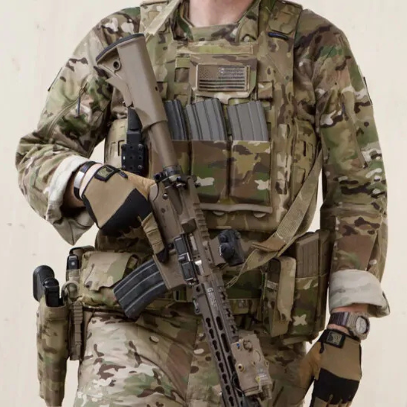 Operator wearing a tactical kit equipped with the Blue Force Gear Boo Boo Kit Pouch for carrying compact medical and utility items.