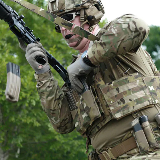 Blue Force Gear Ten-Speed Triple M4 Mag Pouch installed on tactical plate carrier during range training showing lightweight triple rifle mag storage system
