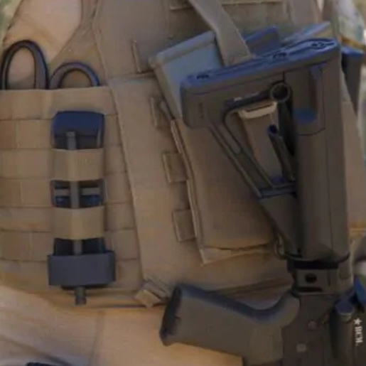 Blue Force Gear Tourniquet NOW Strap mounted to a plate carrier, demonstrating low-profile tourniquet retention and rapid access to medical equipment.