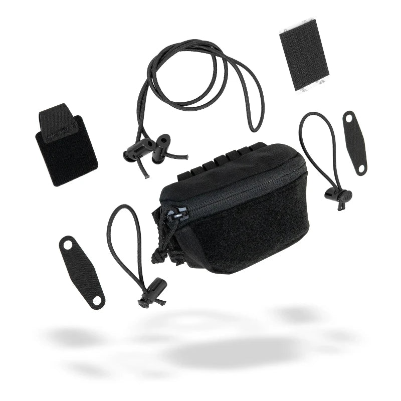 Black tactical pouch with various accessories on a white background