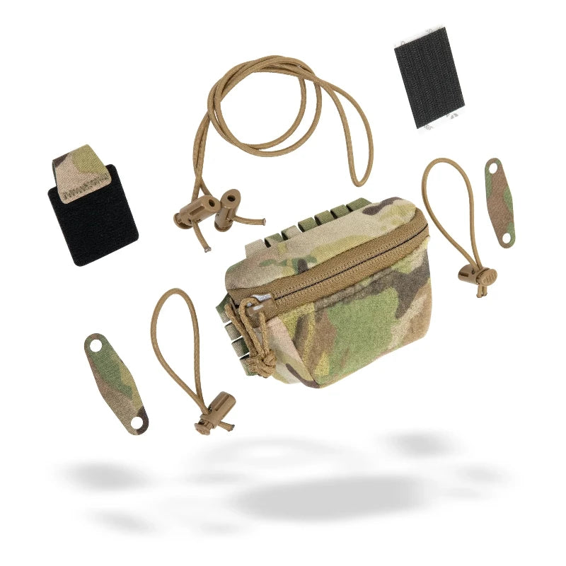 Multicam pouch with various accessories on a white background