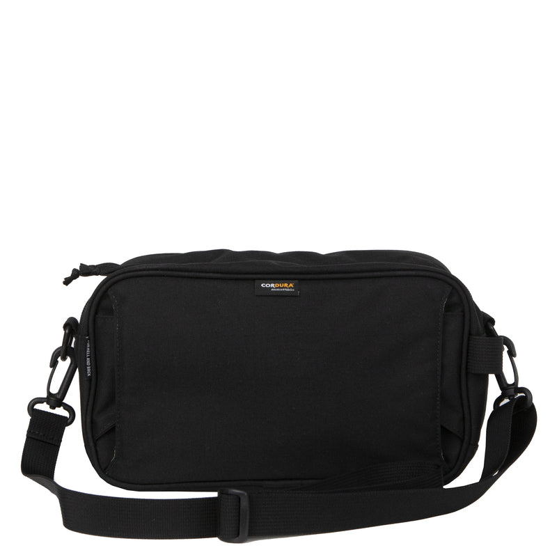 Bravo Co Flee Block I Black shown without the shoulder strap, highlighting the compact 3.9L bag dimensions and rectangular profile for camera and everyday gear storage.