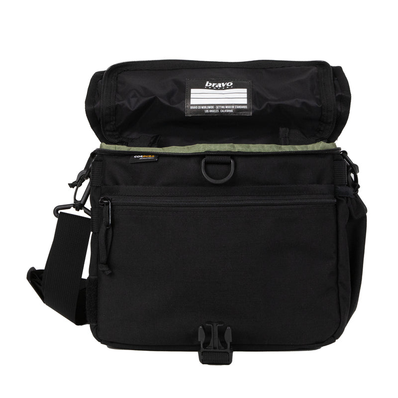 Bravo Co Hull Block 1 Cordura Black with the top flap open, displaying the spacious main compartment, interior organization, and secure closure system.