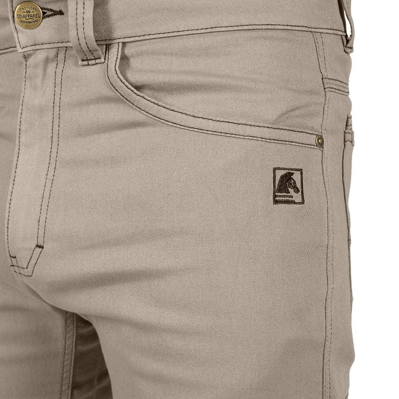 Close-up front side view of Carlos Ray 2.1 TAA Tactical EDC Pants in Flat Dark Earth showing tactical branding label, reinforced front pocket stitching, and durable construction for EDC and range-ready performance