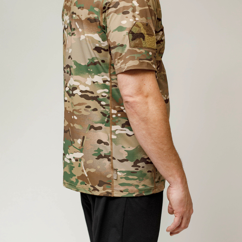 Detailed view of short sleeve MultiCam range shirt highlighting official MultiCam pattern and breathable moisture-wicking performance fabric