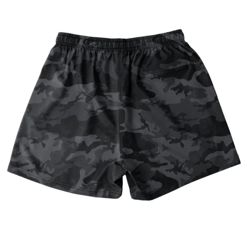 Back view of Cove Black Camo Athletic Shorts made from recycled plastic bottles. Featuring a 5" inseam, elastic waistband with drawstring, and a zippered back pocket for secure storage. Crafted with 90% recycled polyester and 10% spandex, these shorts provide comfort and mobility for gym, swim, or lounging.