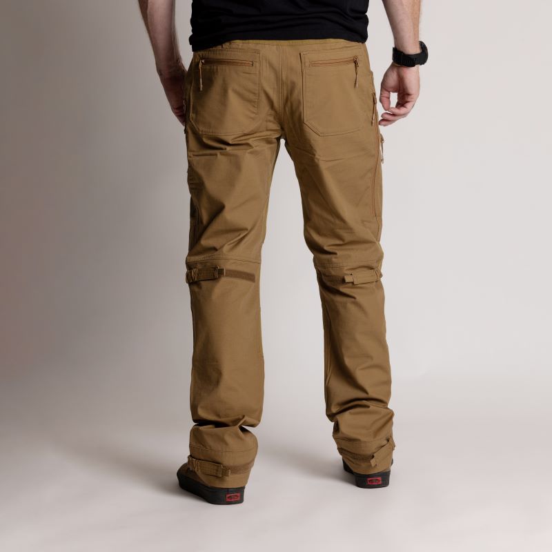 Combat pants with back seat pockets and reinforced heel panels