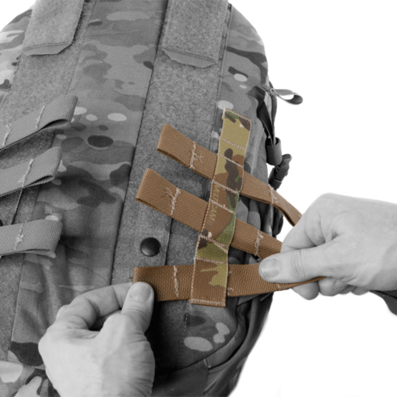 Crye Precision AVS 1000 Pack mounted directly to a Crye AVS plate carrier, showing modular integration as a rear plate bag or attached assault pack, low profile tactical backpack compatible with AVS and JPC systems for mission adaptable loadouts