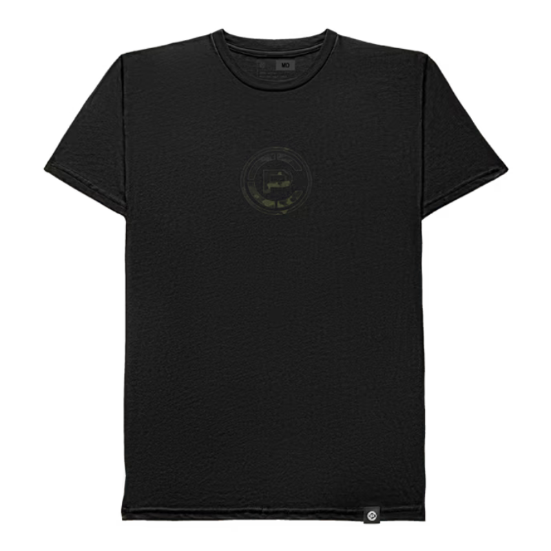 A black short-sleeve crewneck t-shirt with a subtle tonal circular "CP" graphic printed on the center chest in Multicam Black, displayed flat against a solid white background.