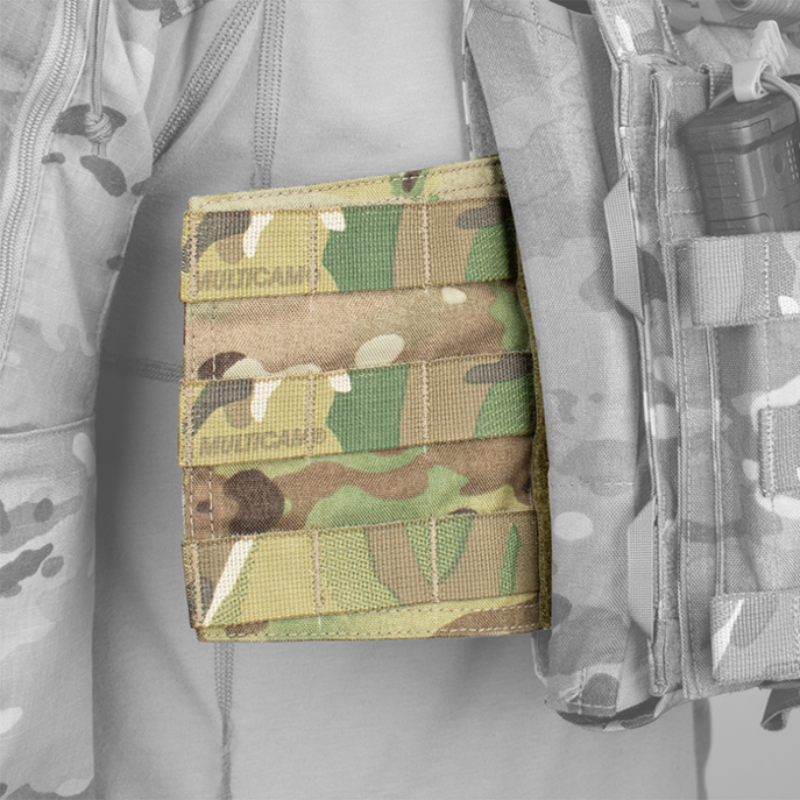 Crye Precision R-Series Side MOLLE Panel Set attached to a plate carrier, demonstrating additional side-mounted MOLLE space for mission-essential gear.