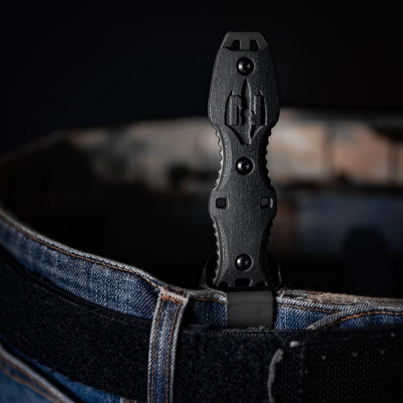 Close-up showing the Dynamis Neptune knife seated in the fitted IWB sheath, demonstrating secure retention and low-profile concealment for safe everyday carry.