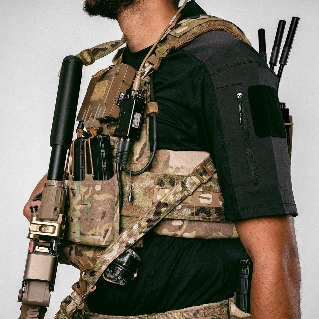 Operator wearing heavily equipped plate carrier with Ferro Concepts ADAPT 3AC Cummerbund maintaining stability, comfort, and mobility during movement