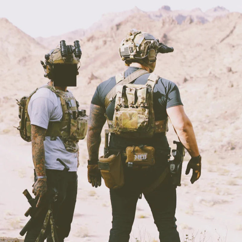 Operators equipped with Ferro Concepts Back Panel Banger demonstrating scalable rear storage during movement and field training