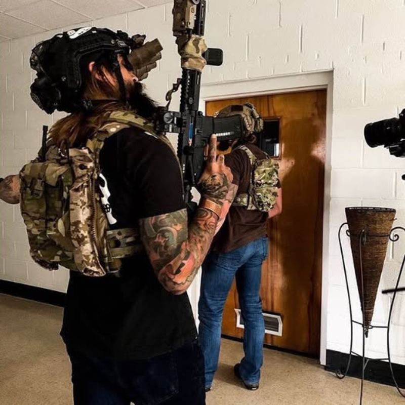 Photo showing the Ferro Concepts FCPC V5 Base Plate Carrier worn during daily tactical work demonstrating its lightweight comfortable fit, secure plate pockets, and modular MOLLE panels for carrying essential gear. This plate carrier is trusted by operators and law enforcement for everyday mission readiness and practical field performance