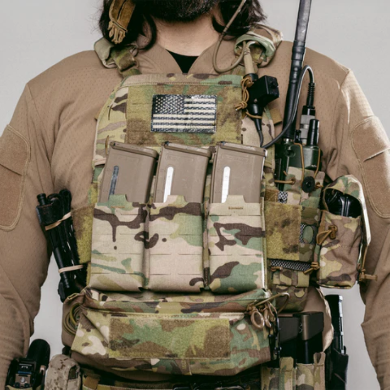 Operator wearing plate carrier equipped with Ferro Concepts KTAR Front Flap showing streamlined triple magazine setup