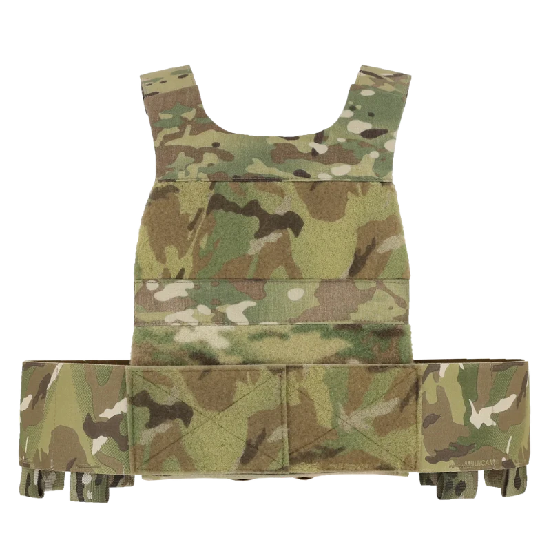 Back view of the Ferro Concepts Slickster Plate Carrier in MultiCam showing the rear plate pocket, loop Velcro panel for ID patches, and laser-cut slots at the bottom for attaching accessories like tourniquets. The mesh-lined plate bag provides comfort and breathability while the adjustable cummerbund ensures a secure, low-profile fit. Ideal for modular tactical setups, covert missions, and adaptable combat operations