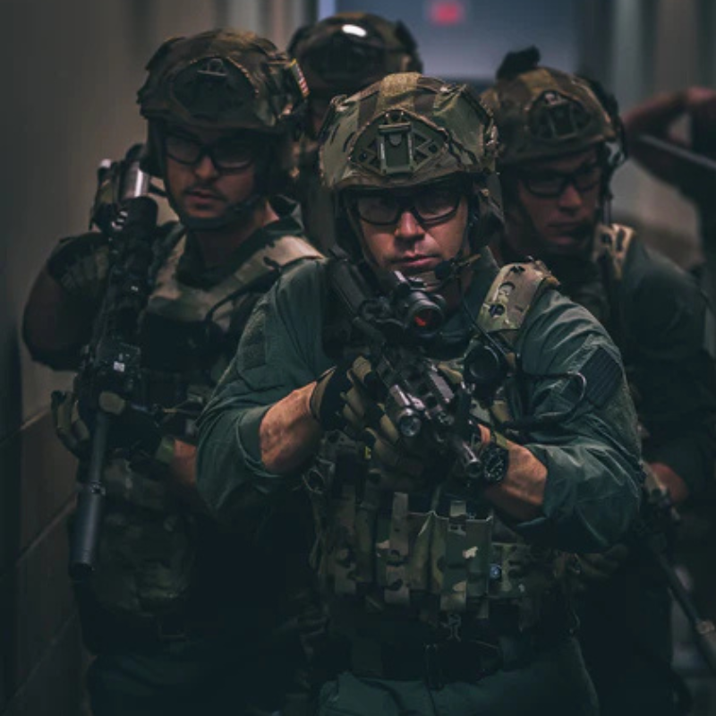 Operators equipped with Ferro Concepts TEAR Front Flap demonstrating low profile magazine storage and rapid reload access during tactical operations