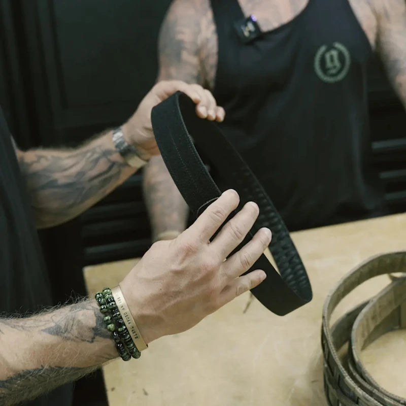 GBRS Group Assaulter Belt System V3 inner EDC belt held up to show low profile scuba webbing construction, 1.5 inch concealed carry support belt designed for IWB holster carry and integration with two piece tactical battle belt system made in the USA