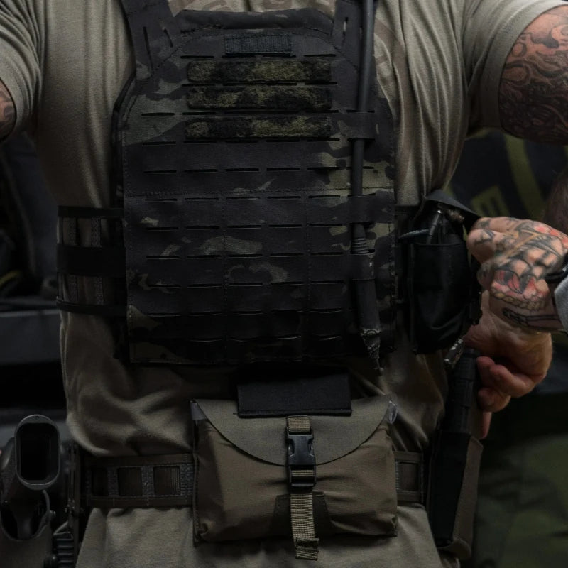 GBRS Group IFAS Individual First Aid System Pouch mounted on duty kit in field environment showing tactical medical pouch ready for real world use